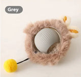 Grey PawActivate Smart Play Ball with plush outer cover and yellow pom-pom tail for pet entertainment and engagement.